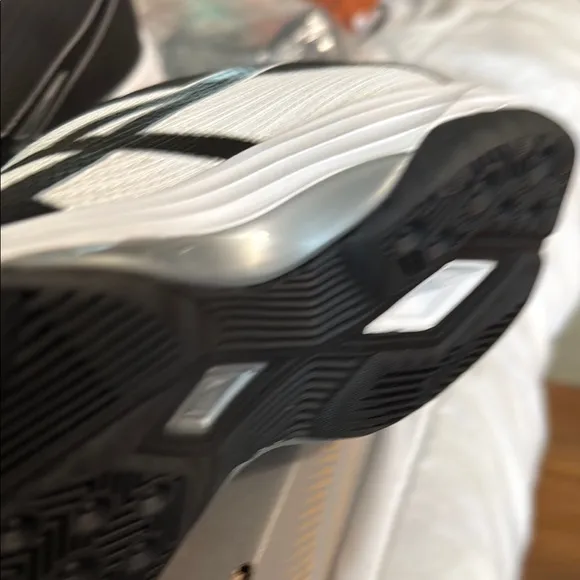 Asics Black and White Athletic Shoes with Modern Design