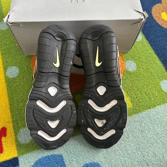 Nike Orange and Black Sneakers with Dynamic Design